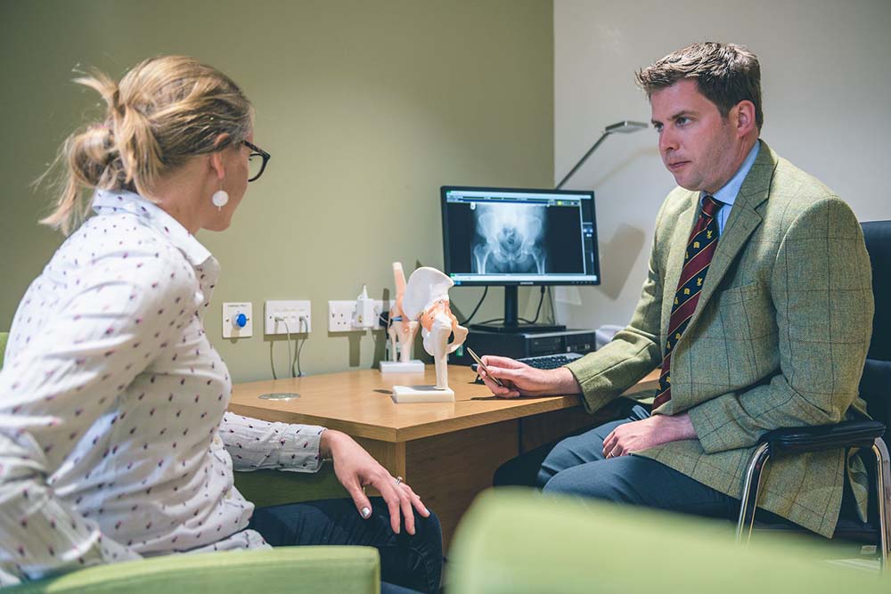 Alex Discussing Surgery with Patient