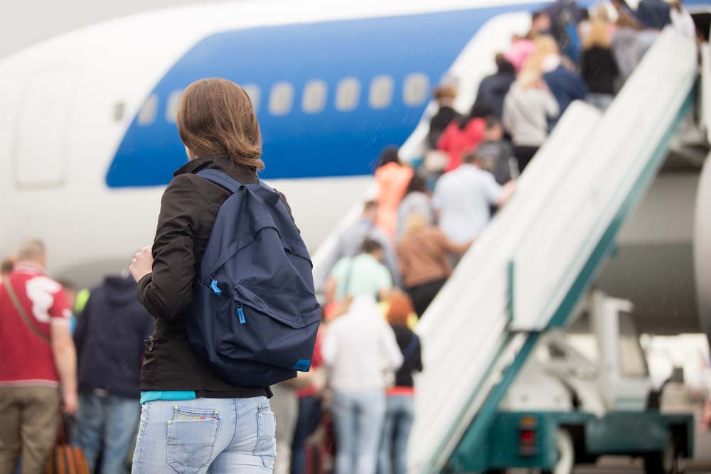 People Boarding a Plane